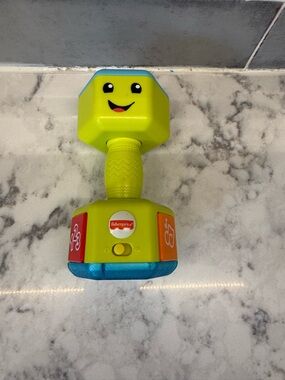 Fisher-Price Lime Green Smiley Rattle Toy with Blue and Orange Panels